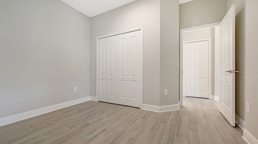 Spacious, unfurnished interior of a new home in Boca Royale Golf and Country Club at Wellen Park, Englewood (Image 34).
