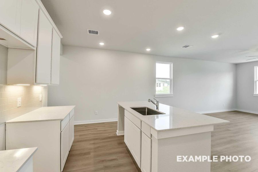 Furnished interior view inside a new home in Windmill Estates, Magnolia (Image 6).