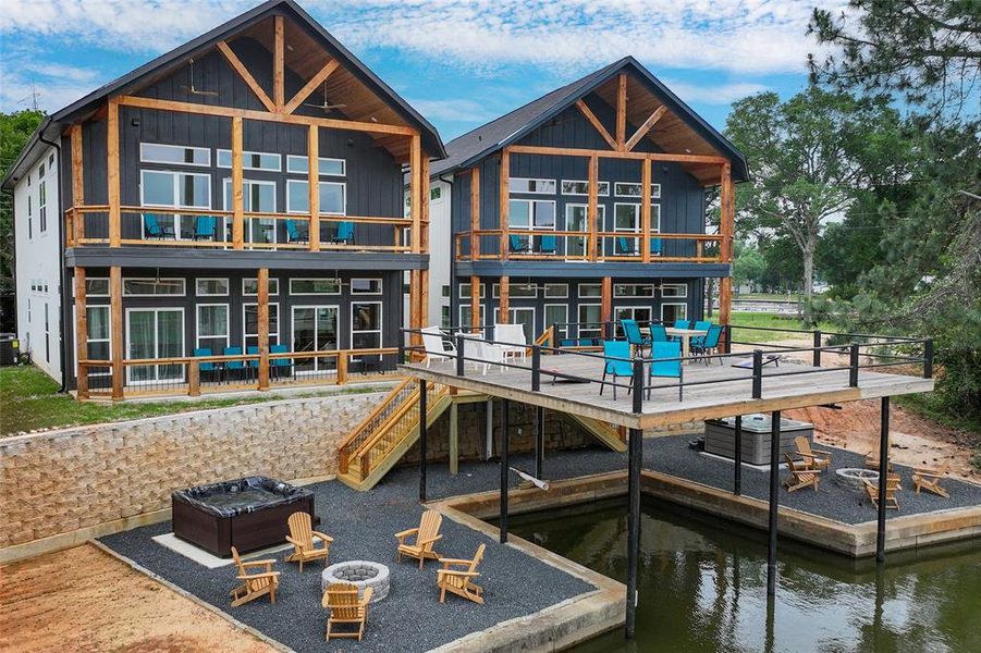 View of back of home and boat dock