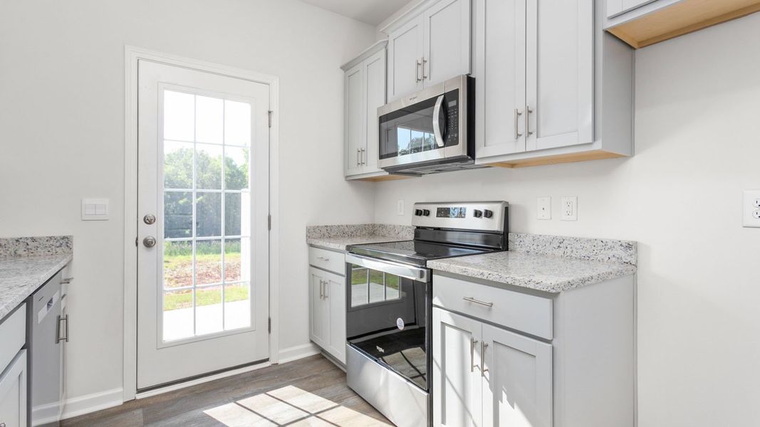 Furnished interior view inside a new home in Henley Ridge, Graham (Image 4).