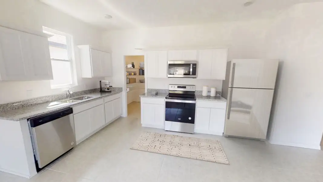 Representative furnished interior of a home built from the Polaris by Starlight Homes in Hawks Run, Kissimmee (Image 4).
