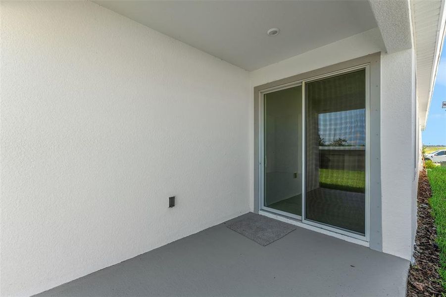 Exterior details and patio area of a home in Seaire, Parrish (Image 4).