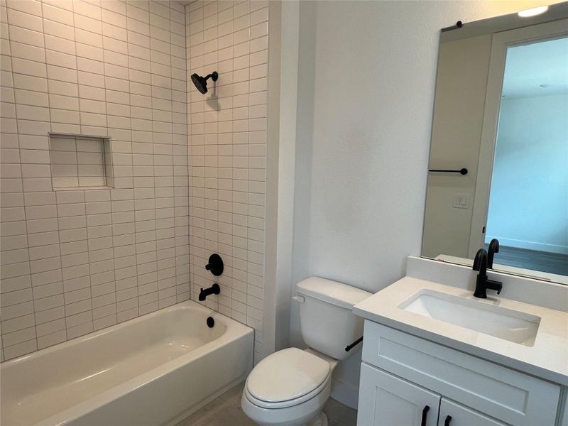 Furnished interior view inside a new home in The Grove, Austin (Image 14).