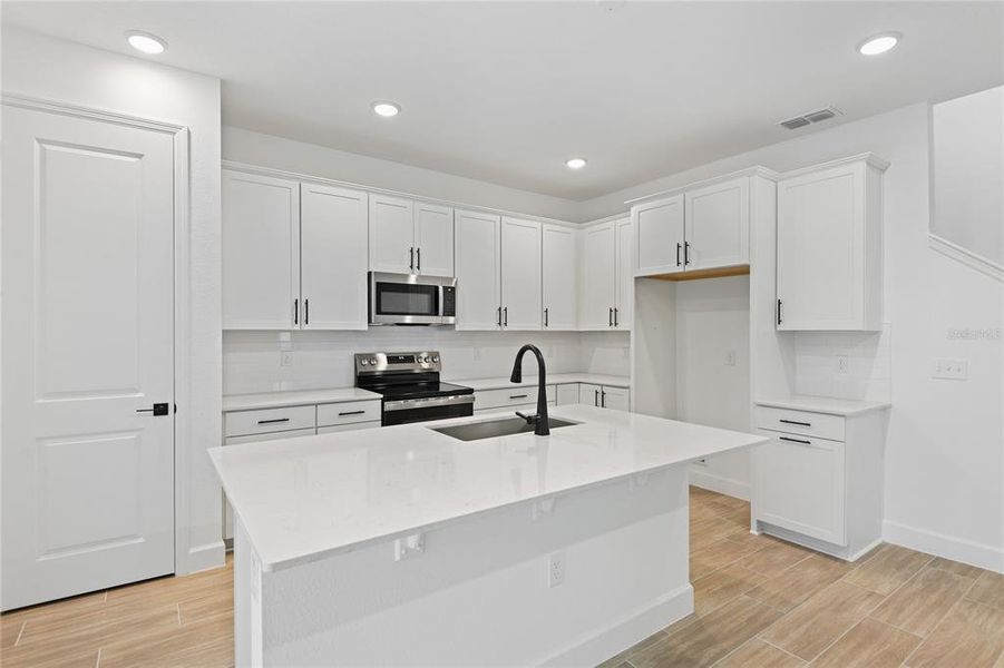 Furnished interior view inside a new home in Seasons at Wekiva Ridge, Mount Dora (Image 10).