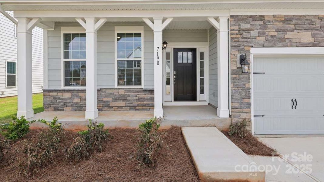 Front exterior of a new home in Sylvan Creek, Denver, NC, highlighting curb appeal (Image 2).