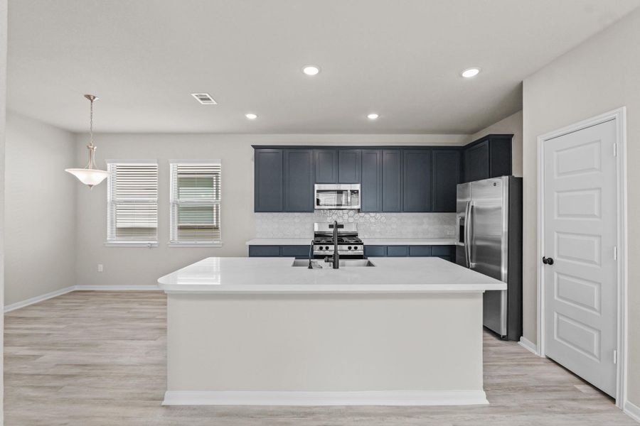 Gorgeous island kitchen (*Photo not of actual home and used for illustration purposes only.)