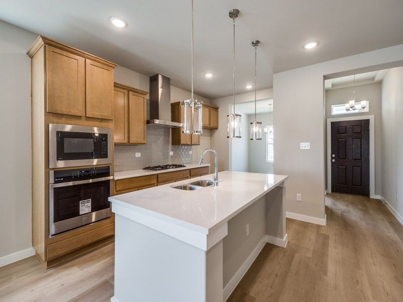 Representative furnished interior of a home built from the Roswell by Hakes Brothers in Hunters Ranch, San Antonio (Image 6).