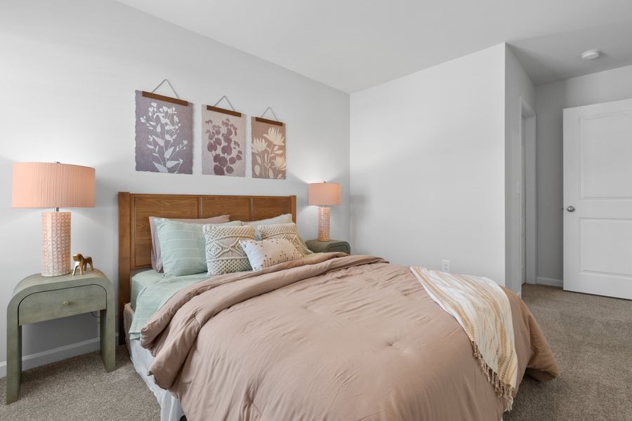Representative furnished interior of a home built from the Palmetto II by McGuinn Homes in Clarke Townes, Anderson (Image 44).