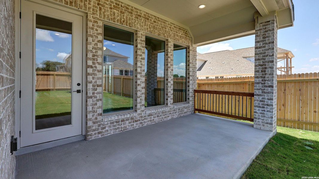 Exterior details and patio area of a home in Kallison Ranch, San Antonio (Image 27).