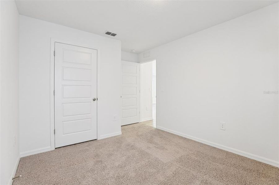 Spacious, unfurnished interior of a new home in Villamar, Winter Haven (Image 21).