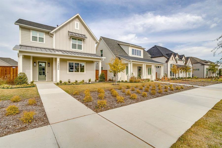 Front exterior of a new home in Walsh, Fort Worth, TX, highlighting curb appeal (Image 1). Front exterior of a new home in Walsh, Fort Worth, TX, highlighting curb appeal (Image 1).