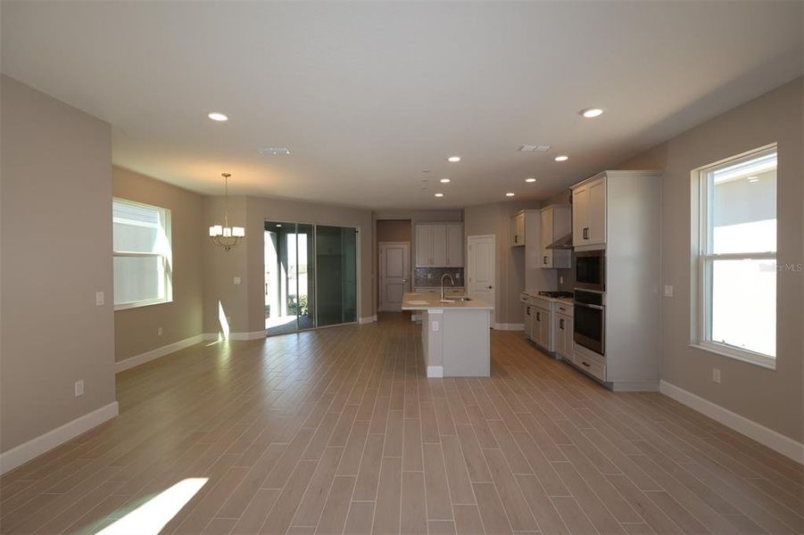Spacious, unfurnished interior of a new home in Lake Star at Ovation, Winter Garden (Image 11).