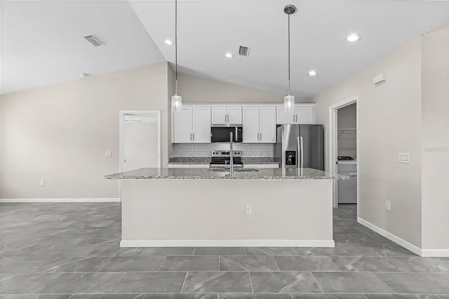 Furnished interior view inside a new home in , Cape Coral (Image 4).