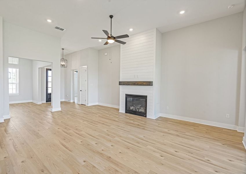 The living room has plenty of space for large furniture.