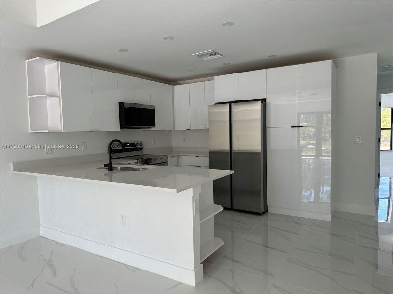 Furnished interior view inside a new home in , Lehigh Acres (Image 3).