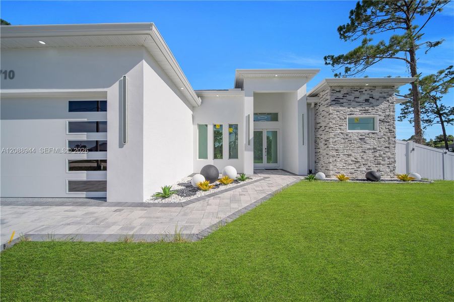Exterior details and patio area of a home in , Lehigh Acres (Image 4).