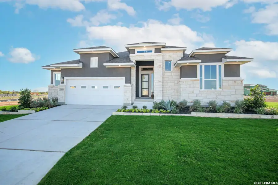 Front exterior of a new home in , New Braunfels, TX, highlighting curb appeal (Image 1). Front exterior of a new home in , New Braunfels, TX, highlighting curb appeal (Image 1).