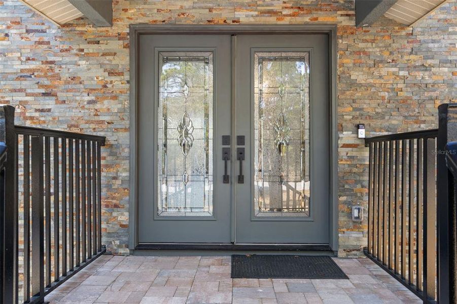 Exterior details and patio area of a home in , Webster (Image 40).