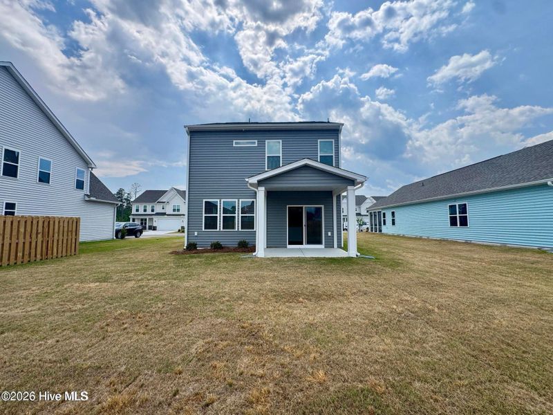 Exterior details and patio area of a home in Coastal Haven, Leland (Image 3).
