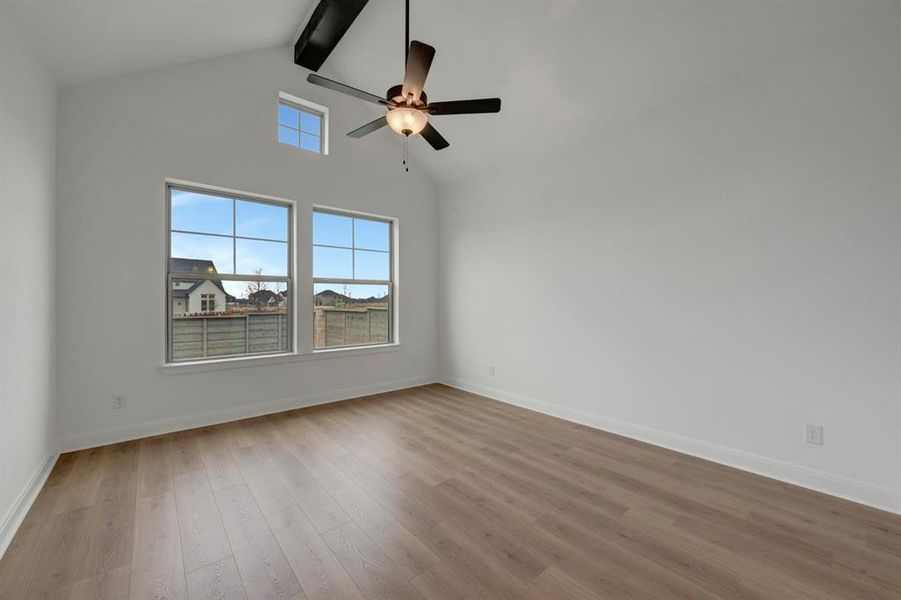 Unfurnished room with wood finished floors and ceiling fan