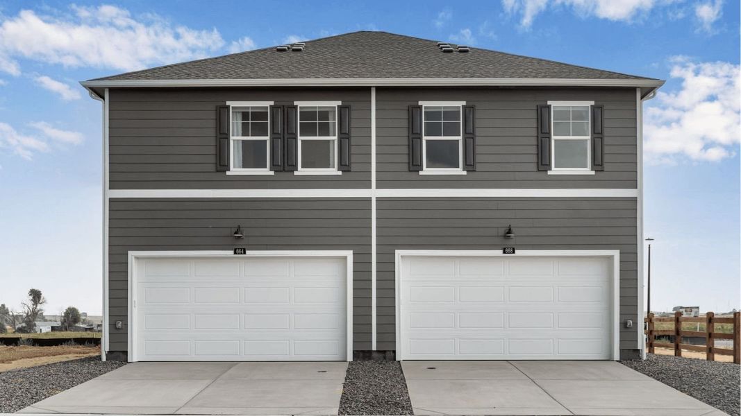 Front exterior of a new home in Vista Meadows, Fort Lupton, CO, highlighting curb appeal (Image 2). Front exterior of a new home in Vista Meadows, Fort Lupton, CO, highlighting curb appeal (Image 2).