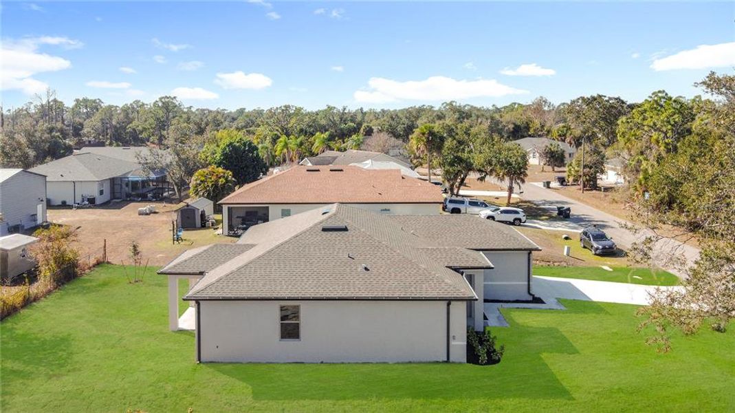 Exterior details and patio area of a home in , North Port (Image 29).