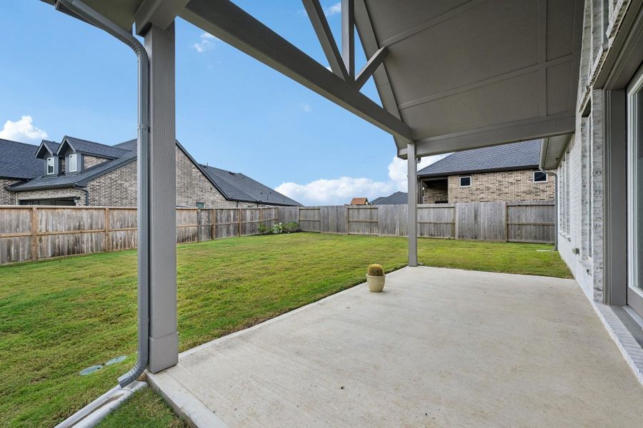 Large covered patio with cathedral ceiling