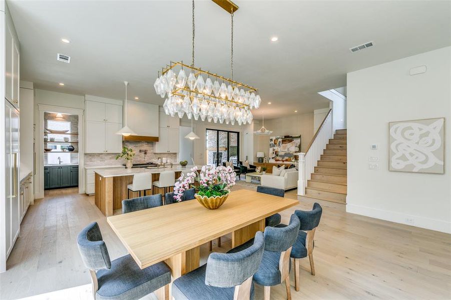 Dining space with light wood-type flooring