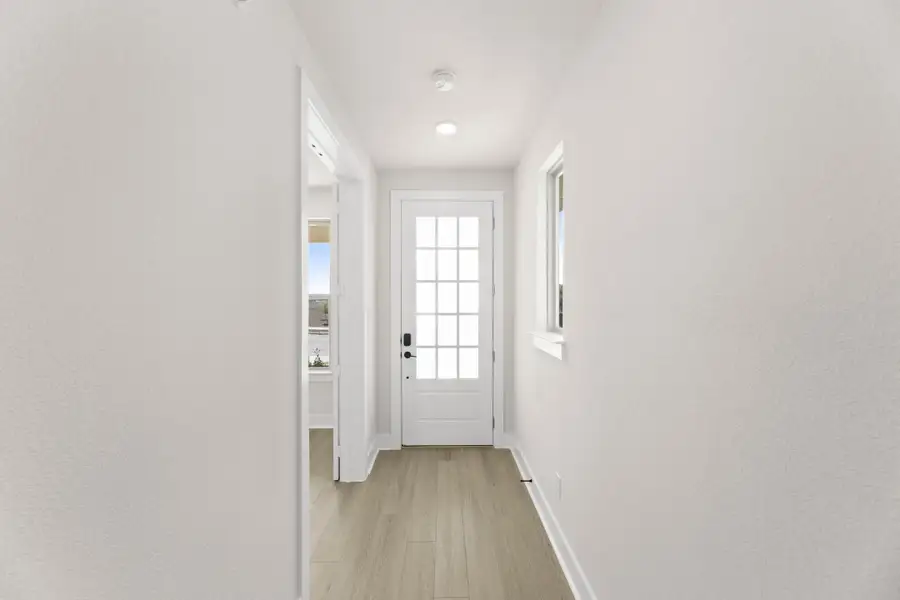 Image 5 representing the Holly by Tri Pointe Homes in Treeline, Justin, TX.