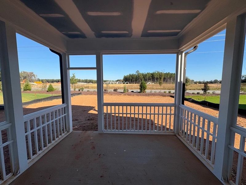 Screened-In Porch featuring the AW Collection® Harmony - A lovely spot to sip and unwind. Screened-In Porch featuring the AW Collection® Harmony - A lovely spot to sip and unwind.