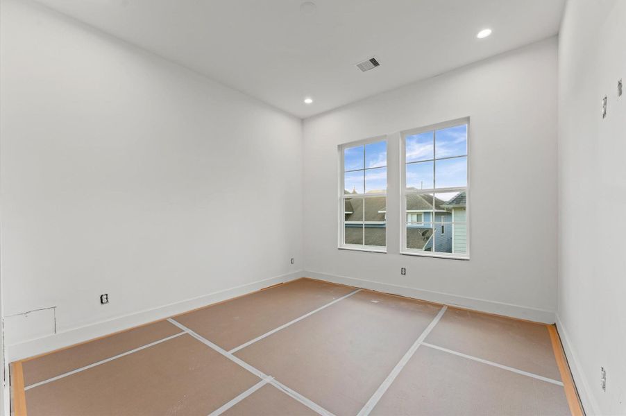 Upstairs secondary bedroom.
