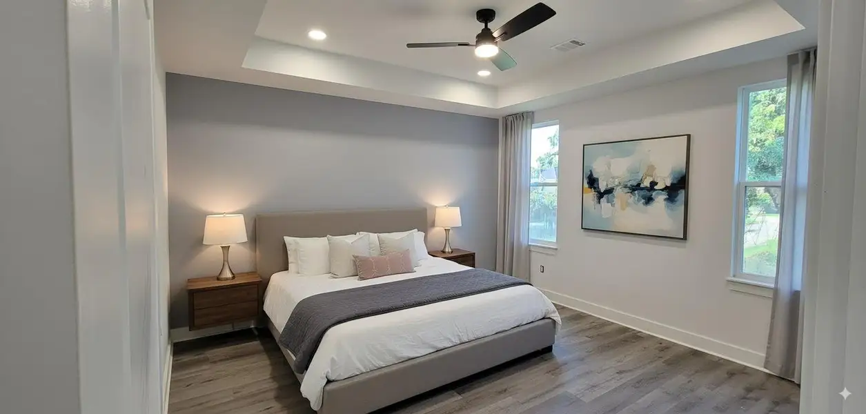 Primary bedroom suite with 10ft high coffered ceiling. Primary bedroom suite with 10ft high coffered ceiling.