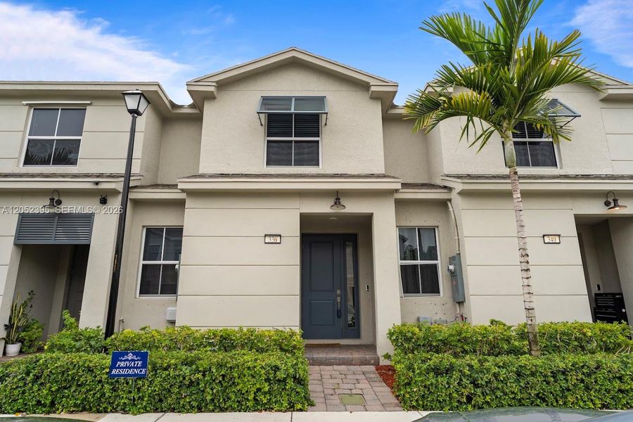 Front exterior of a new home in , Pompano Beach, FL, highlighting curb appeal (Image 1). Front exterior of a new home in , Pompano Beach, FL, highlighting curb appeal (Image 1).