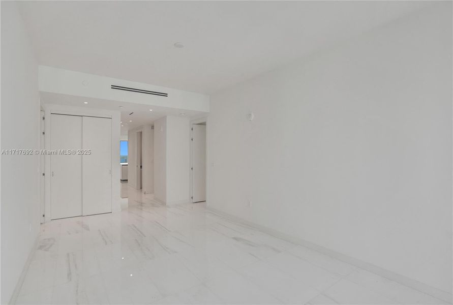 Spacious, unfurnished interior of a new home in Aston Martin Residences, Miami (Image 17).