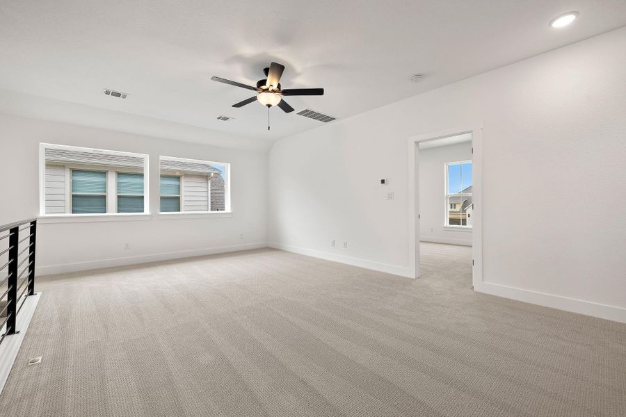 Spacious, unfurnished interior of a new home in Blackhawk in Pflugerville, Pflugerville (Image 25).