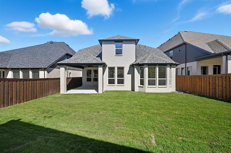 Exterior details and patio area of a home in Walsh: Artisan Series - 50' lots, Aledo (Image 2).