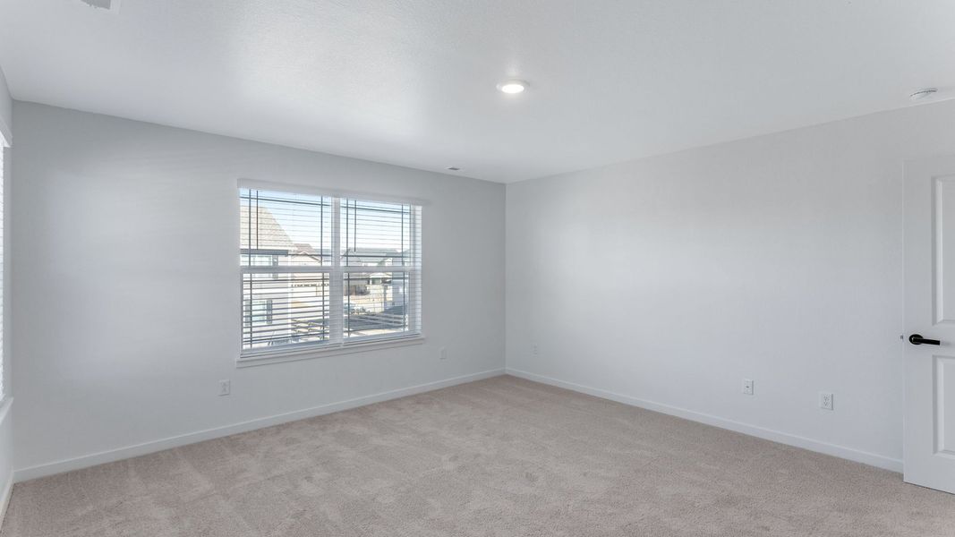 Representative unfurnished interior of a home built from the Calhan by D.R. Horton in Vantage, Berthoud (Image 21).