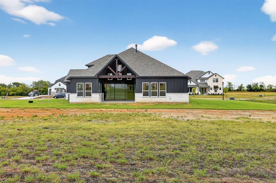 Front exterior of a new home in Highland Crossing, Celina, TX, highlighting curb appeal (Image 15). Front exterior of a new home in Highland Crossing, Celina, TX, highlighting curb appeal (Image 15).