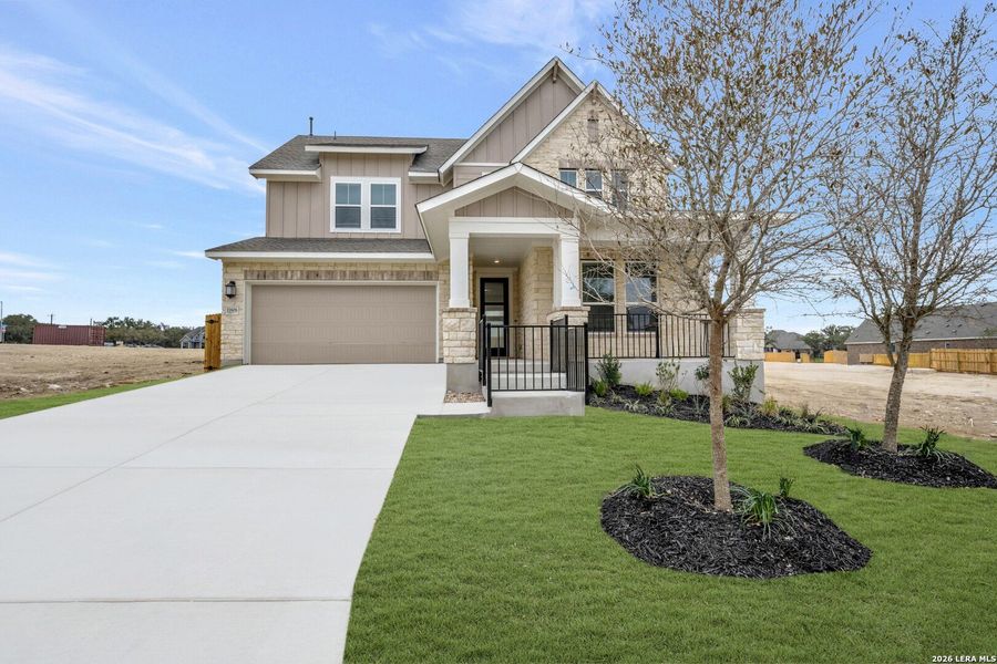 Front exterior of a new home in Davis Ranch 50', San Antonio, TX, highlighting curb appeal (Image 19).