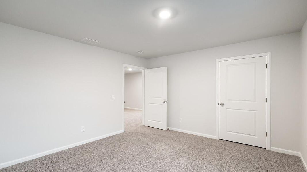 Spacious, unfurnished interior of a new home in The Cove at Mallard Crossing, Summerville (Image 20).