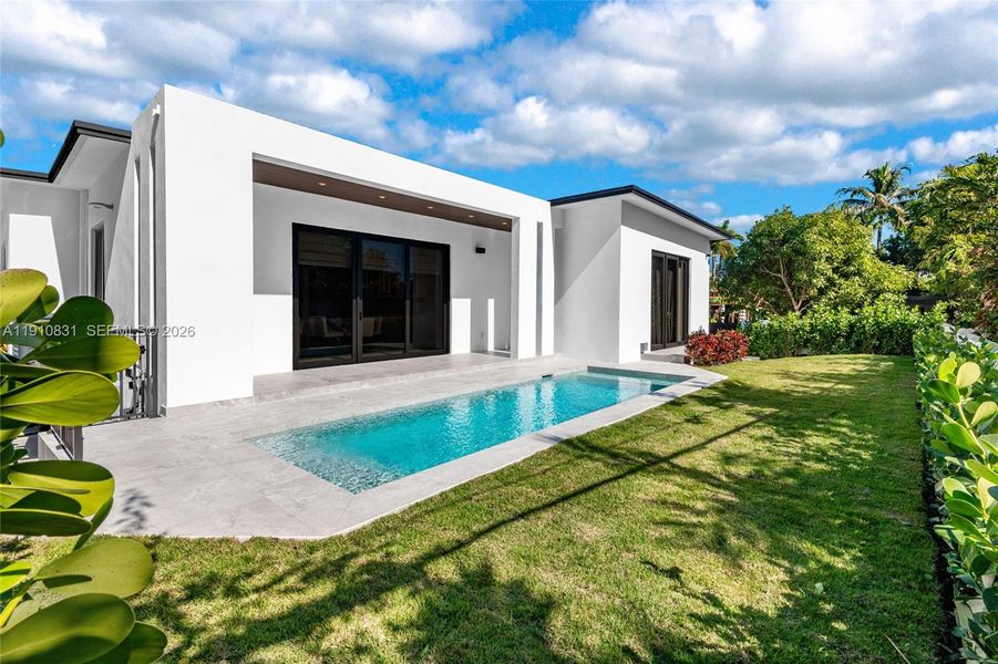 Exterior details and patio area of a home in , Miami Beach (Image 25).