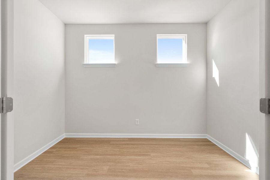 Representative unfurnished interior of a home built from the The Dawson C by Davidson Homes LLC in Kelly Preserve, Loganville (Image 9).