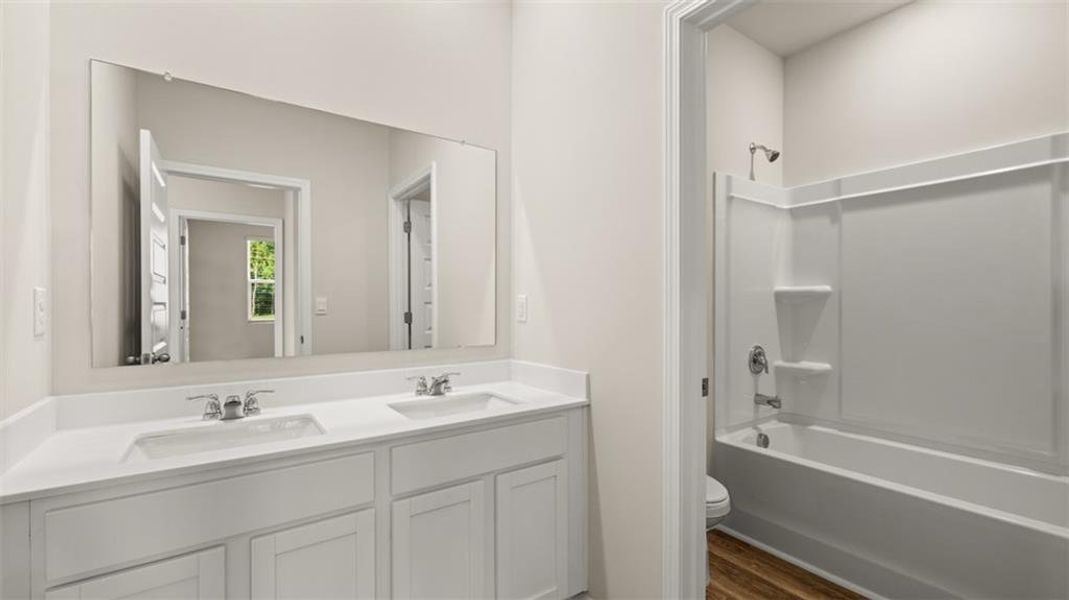 Furnished interior view inside a new home in Preserve at Dove Creek, Statham (Image 5).