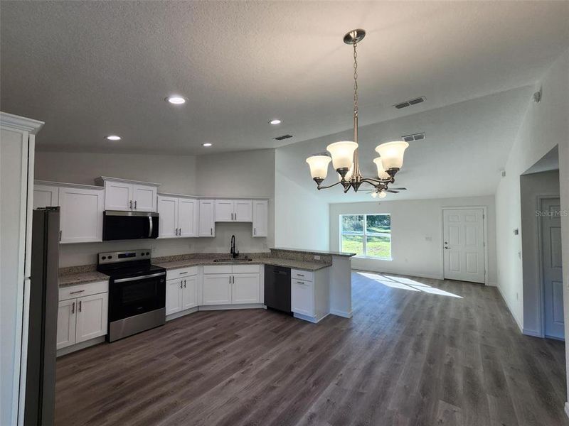 Furnished interior view inside a new home in , Dunnellon (Image 3).