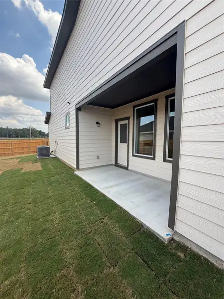 Front exterior of a new home in Valverde, Bastrop, TX, highlighting curb appeal (Image 2). Front exterior of a new home in Valverde, Bastrop, TX, highlighting curb appeal (Image 2).