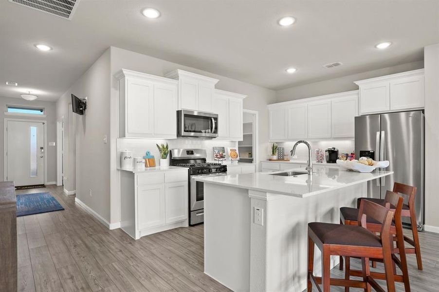 Kitchen in the Masters home plan by Trophy Signature Homes – REPRESENTATIVE PHOTO Kitchen in the Masters home plan by Trophy Signature Homes – REPRESENTATIVE PHOTO