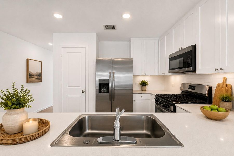 A closer look at the kitchen workspace, designed with both function and entertaining in mind.