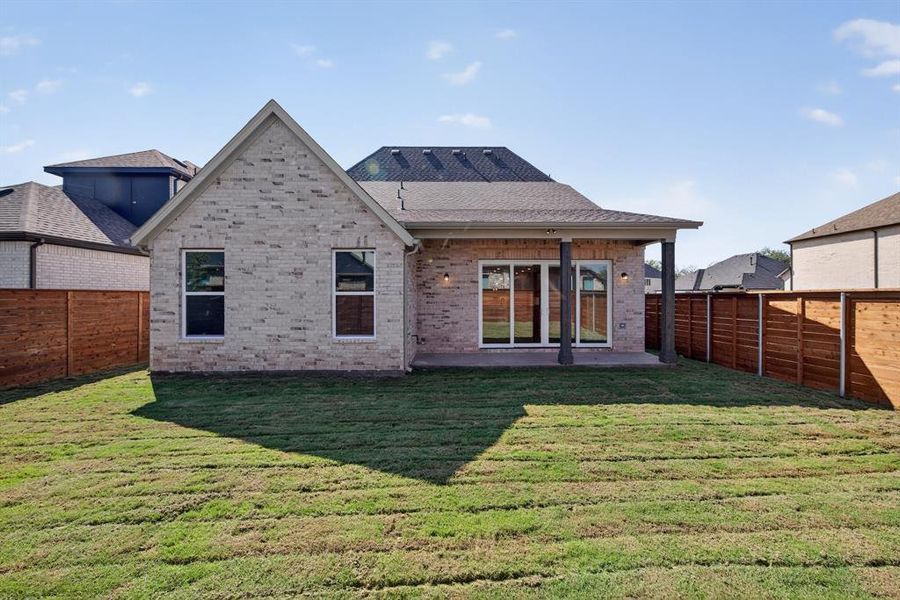 Exterior details and patio area of a home in Solterra, Mesquite (Image 1).