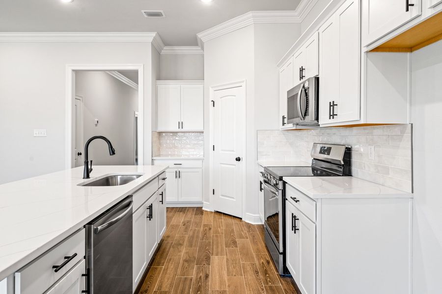 Furnished interior view inside a new home in Sentinel Ridge, Pace (Image 7).