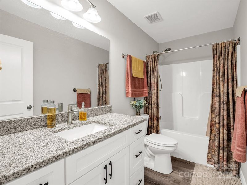 Furnished interior view inside a new home in , Black Mountain (Image 11).